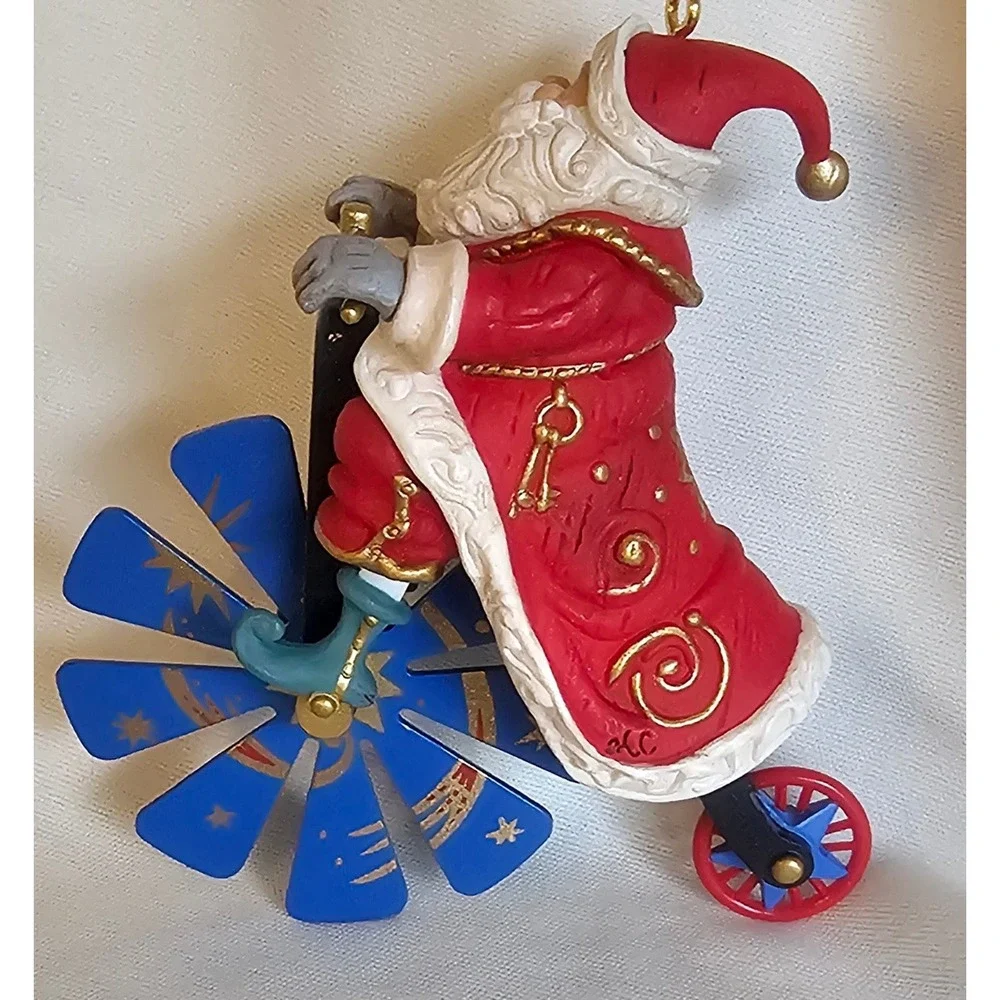 Vintage 1999 Santa Claus on Bicycle Christmas Ornament Red Blue 4.25